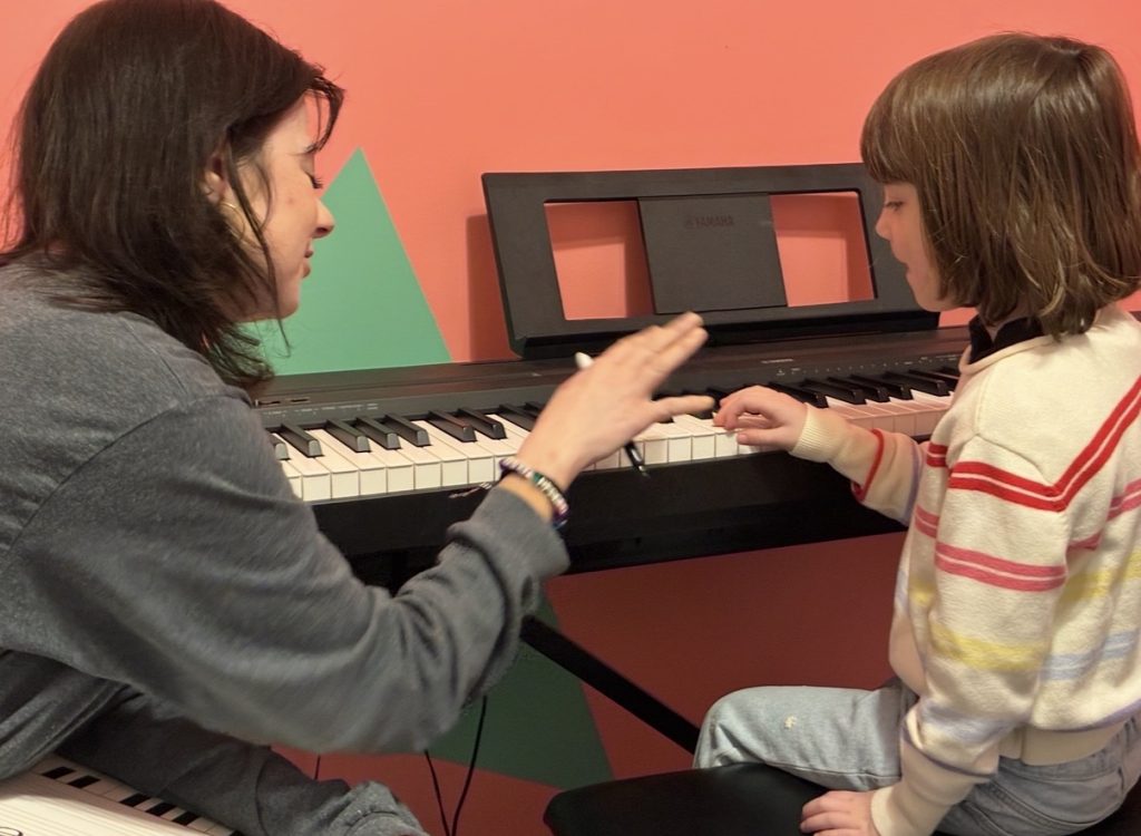 child playing piano
