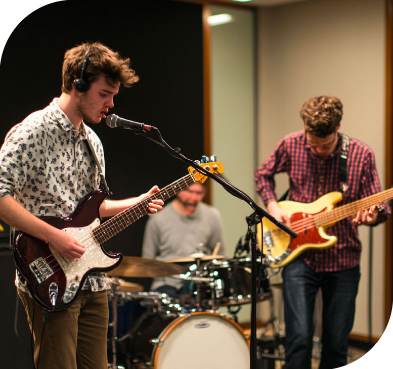 Student musicians performing together in a live ensemble as part of music school performance opportunities.